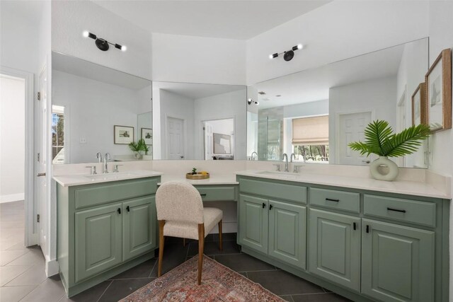 9943 Derecho Dr, Austin, TX 78737 - bathroom featuring double vanity, tile patterned floors, and plenty of natural light