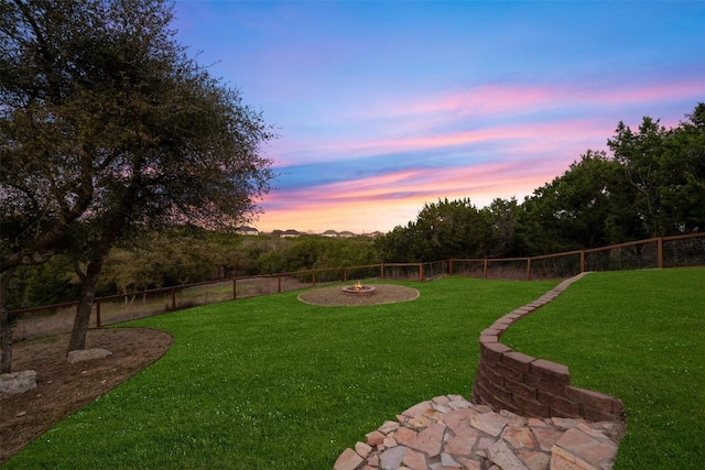 9943 Derecho Dr, Austin, TX 78737 - yard at dusk featuring a fire pit