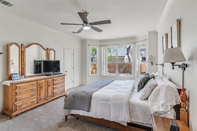 2535 Crenshaw Dr, Round Rock, TX 78664 - bedroom featuring crown molding, light colored carpet, and ceiling fan