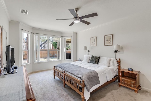 2535 Crenshaw Dr, Round Rock, TX 78664 - carpeted bedroom with crown molding, a ceiling fan, and baseboards