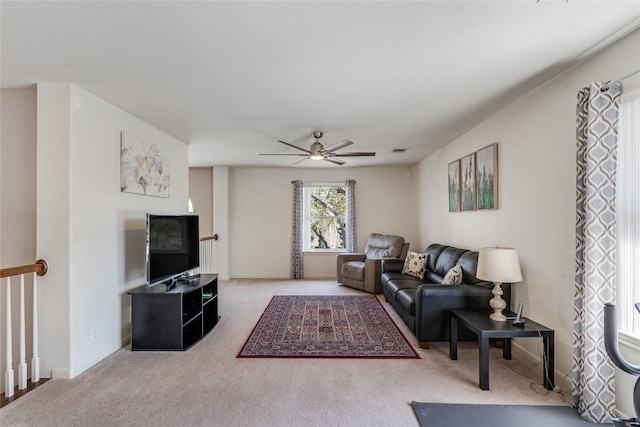 2535 Crenshaw Dr, Round Rock, TX 78664 - living room featuring carpet floors, a ceiling fan, and baseboards