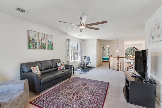 2535 Crenshaw Dr, Round Rock, TX 78664 - living area with a ceiling fan and carpet flooring