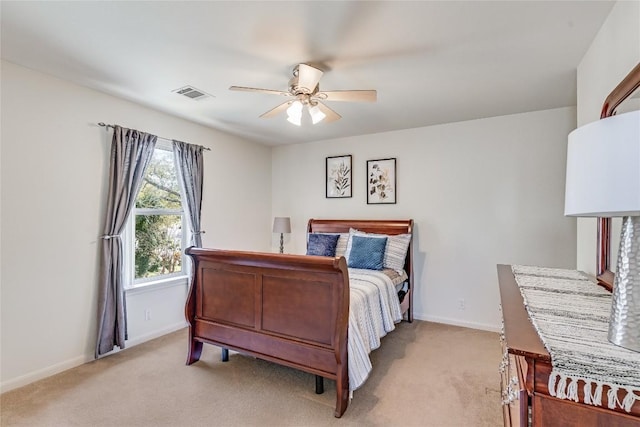 2535 Crenshaw Dr, Round Rock, TX 78664 - bedroom featuring light colored carpet, baseboards, and a ceiling fan
