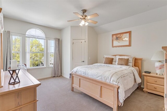 2535 Crenshaw Dr, Round Rock, TX 78664 - bedroom with light colored carpet, baseboards, a ceiling fan, and lofted ceiling