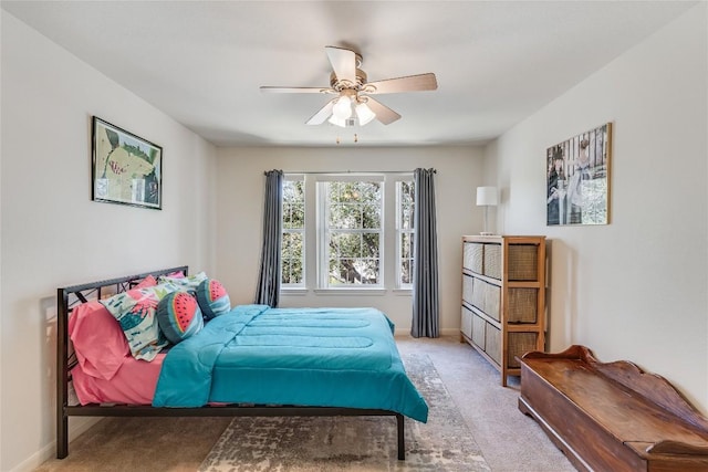 2535 Crenshaw Dr, Round Rock, TX 78664 - bedroom with light colored carpet, a ceiling fan, and baseboards