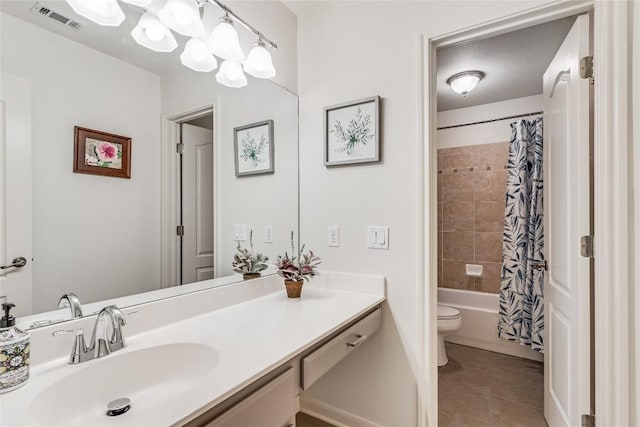 2535 Crenshaw Dr, Round Rock, TX 78664 - bathroom featuring tile patterned floors, vanity, toilet, and shower / bath combination with curtain