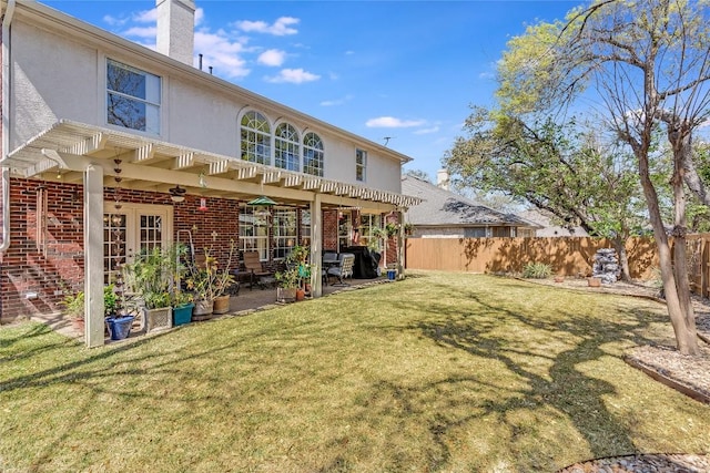 2535 Crenshaw Dr, Round Rock, TX 78664 - back of property featuring brick siding, a patio area, a pergola, and a chimney