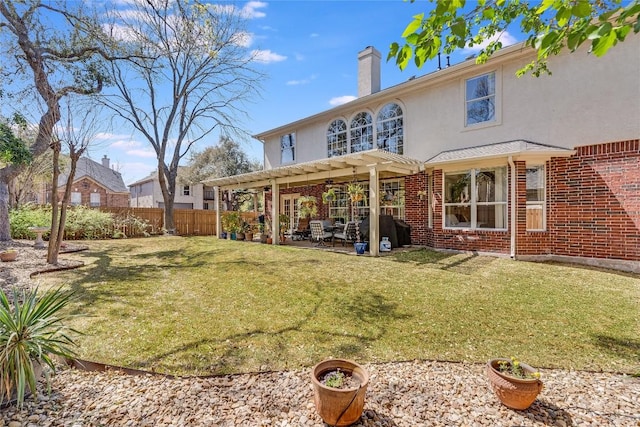 2535 Crenshaw Dr, Round Rock, TX 78664 - back of property featuring a pergola, a patio, a chimney, stucco siding, and brick siding