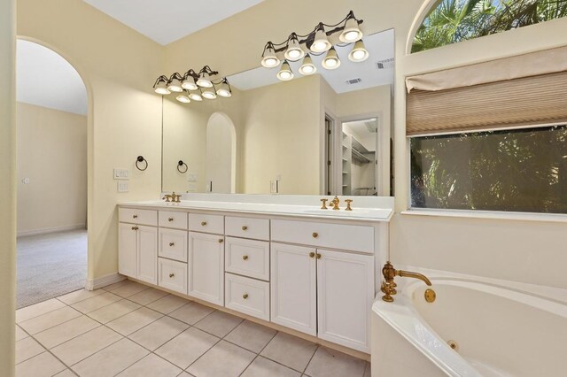 5903 Cane Pace, Austin, TX 78746 - full bath featuring double vanity, tile patterned floors, and a tub with jets