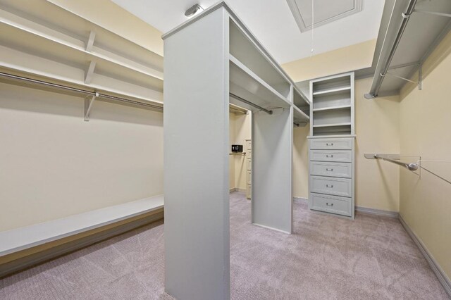 5903 Cane Pace, Austin, TX 78746 - walk in closet with carpet flooring and attic access