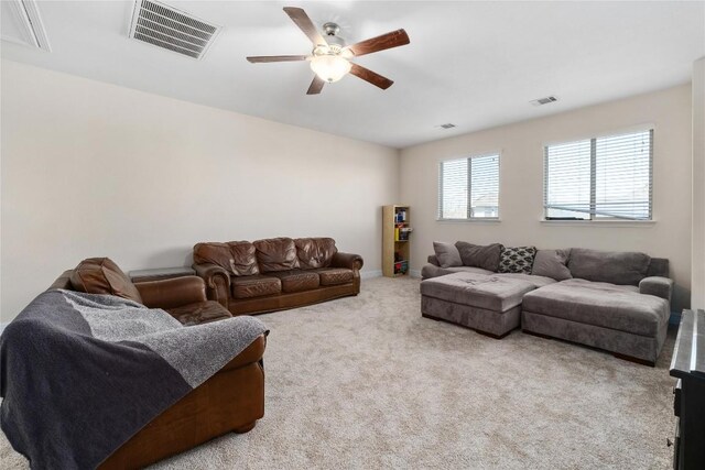100 Adorno Ln, Georgetown, TX 78628 - living area featuring ceiling fan and carpet floors