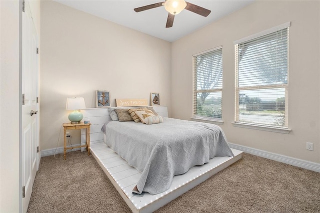 100 Adorno Ln, Georgetown, TX 78628 - carpeted bedroom with baseboards and a ceiling fan