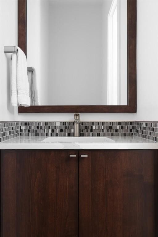 4704 Timberline Dr, Austin, TX 78746 - bathroom with backsplash and vanity