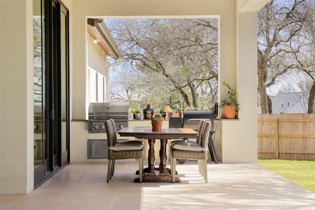 4704 Timberline Dr, Austin, TX 78746 - view of patio with outdoor dining space and exterior kitchen