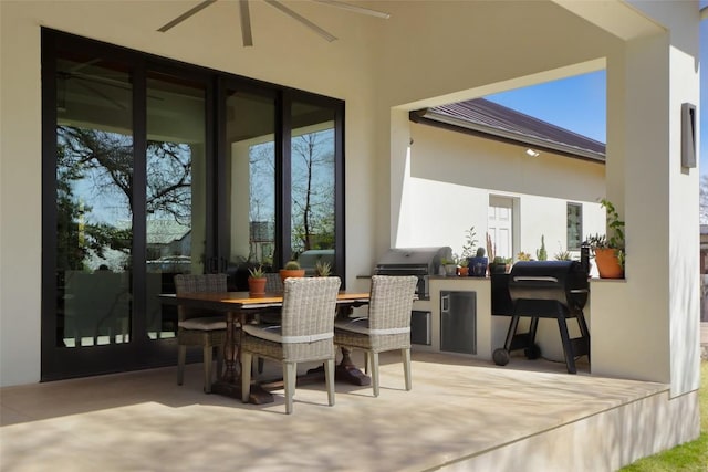 4704 Timberline Dr, Austin, TX 78746 - view of patio featuring an outdoor kitchen, grilling area, and outdoor dining space