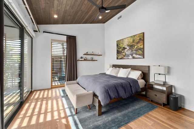 1411 Haskell St, Austin, TX 78702 - bedroom featuring access to outside, wooden ceiling, vaulted ceiling, light wood finished floors, and recessed lighting