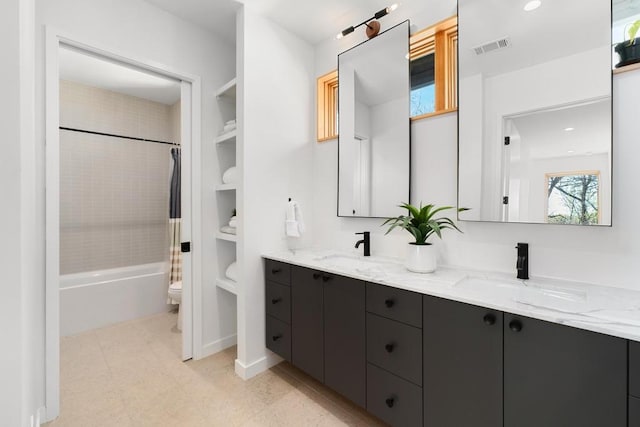 1411 Haskell St, Austin, TX 78702 - bathroom featuring double vanity and shower / bathtub combination with curtain