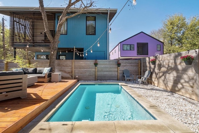 1411 Haskell St, Austin, TX 78702 - view of pool featuring a wooden deck, a fenced backyard, and outdoor lounge area