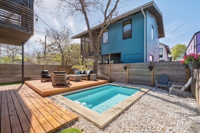 1411 Haskell St, Austin, TX 78702 - view of pool with outdoor lounge area, a wooden deck, and a fenced backyard