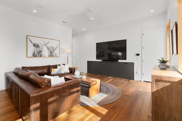 1411 Haskell St, Austin, TX 78702 - living area with wood finished floors, ceiling fan, and recessed lighting