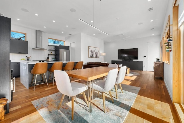 1411 Haskell St, Austin, TX 78702 - dining space featuring recessed lighting and light wood-type flooring