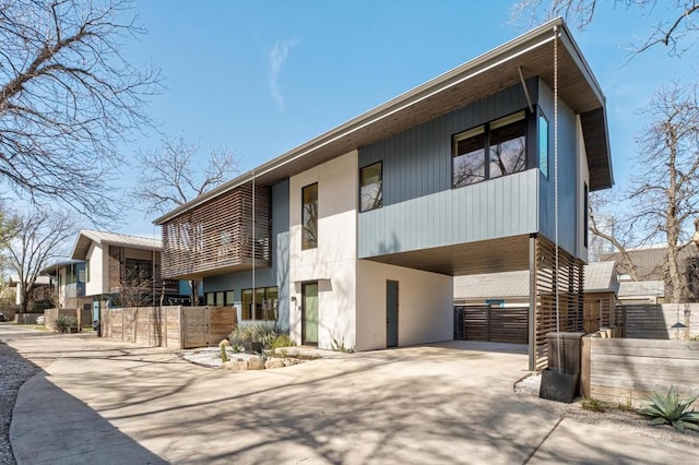 1411 Haskell St, Austin, TX 78702 - view of property featuring driveway and a carport