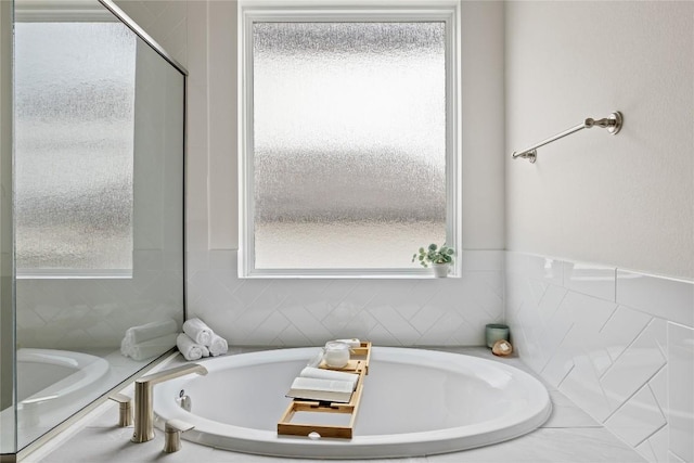 1005 Trevi Fontana, Leander, TX 78641 - bathroom with a bath
