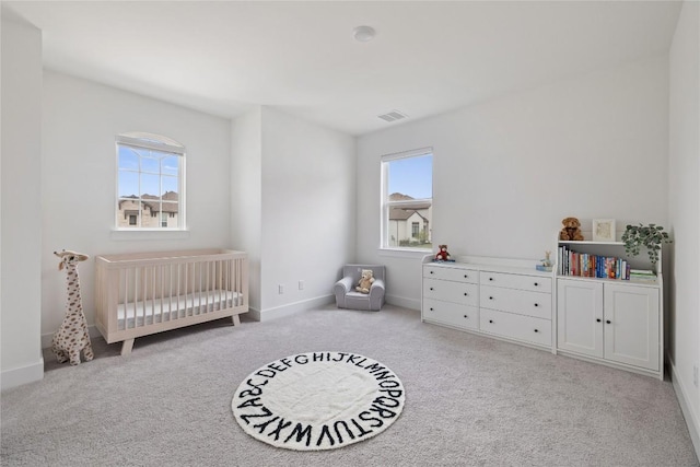 1005 Trevi Fontana, Leander, TX 78641 - bedroom with a nursery area, carpet floors, and radiator heating unit