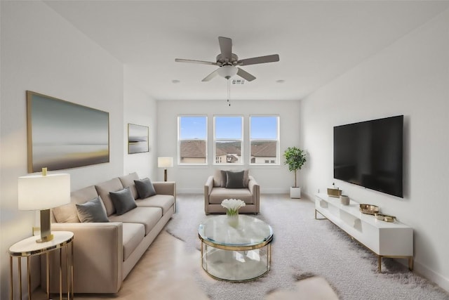 1005 Trevi Fontana, Leander, TX 78641 - living area featuring a ceiling fan and carpet flooring