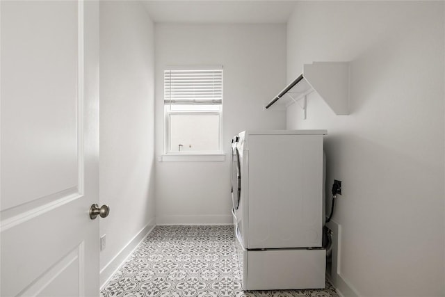 1005 Trevi Fontana, Leander, TX 78641 - laundry room with separate washer and dryer and baseboards