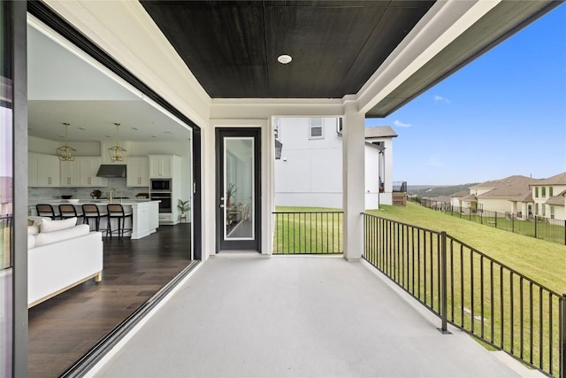 1005 Trevi Fontana, Leander, TX 78641 - covered porch featuring a sink