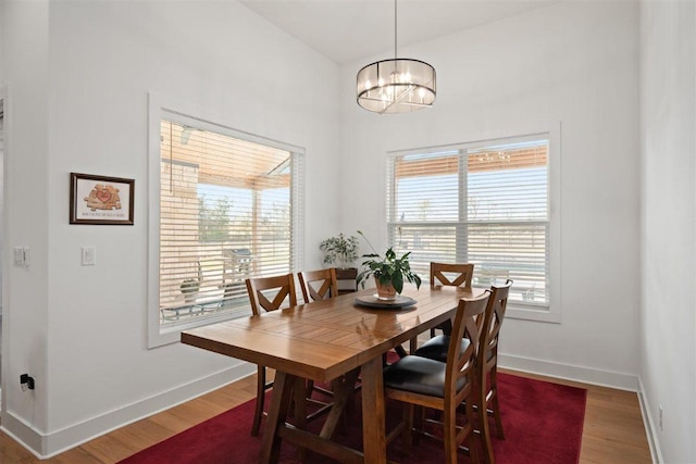 425 Private Road 915, Georgetown, TX 78633 - dining area with baseboards, wood finished floors, and a notable chandelier