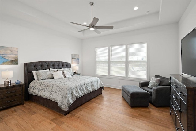 425 Private Road 915, Georgetown, TX 78633 - bedroom featuring baseboards, recessed lighting, light wood finished floors, and a raised ceiling