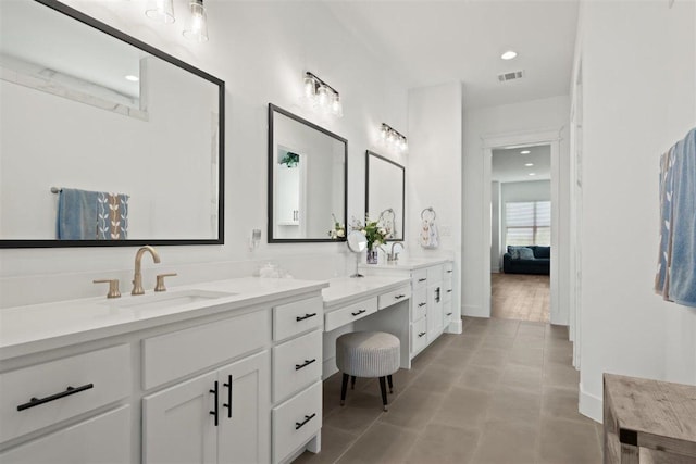 425 Private Road 915, Georgetown, TX 78633 - full bathroom featuring baseboards, recessed lighting, visible vents, vanity, and connected bathroom