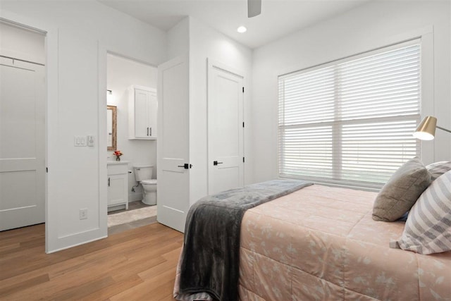 425 Private Road 915, Georgetown, TX 78633 - bedroom featuring recessed lighting, ensuite bath, baseboards, light wood-style flooring, and ceiling fan