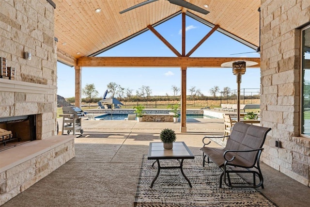 425 Private Road 915, Georgetown, TX 78633 - view of patio featuring grilling area, a gazebo, an outdoor pool, and an outdoor stone fireplace