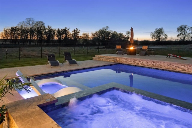 425 Private Road 915, Georgetown, TX 78633 - outdoor pool featuring a fire pit, a patio area, an in ground hot tub, and fence