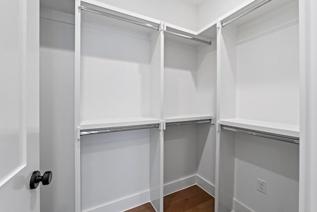710 Philco Dr, Austin, TX 78745 - walk in closet featuring dark wood finished floors