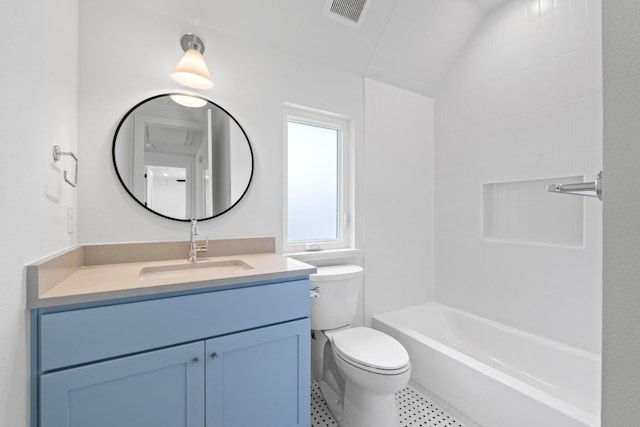 710 Philco Dr, Austin, TX 78745 - bathroom featuring toilet, vanity, bathing tub / shower combination, and tile patterned flooring