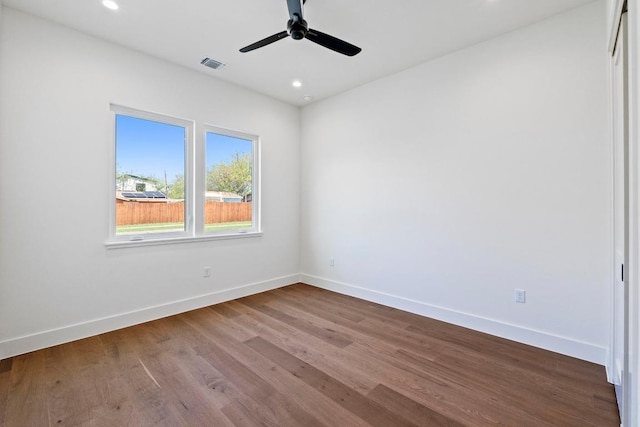 710 Philco Dr, Austin, TX 78745 - unfurnished room with baseboards, visible vents, wood finished floors, and a ceiling fan