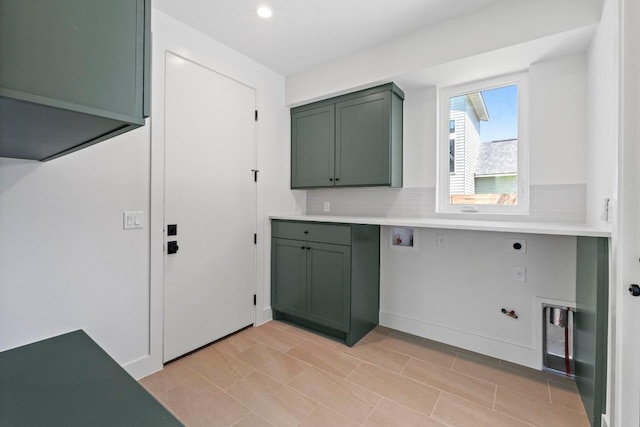 710 Philco Dr, Austin, TX 78745 - washroom with cabinet space, electric dryer hookup, washer hookup, gas dryer hookup, and recessed lighting