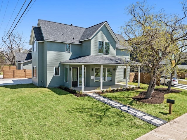 710 Philco Dr, Austin, TX 78745 - view of front of home featuring a shingled roof and covered porch