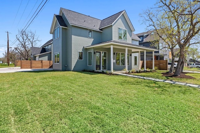 710 Philco Dr, Austin, TX 78745 - rear view of house featuring roof with shingles and a porch