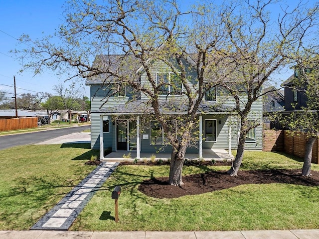 710 Philco Dr, Austin, TX 78745 - view of front of home featuring fence and a front lawn