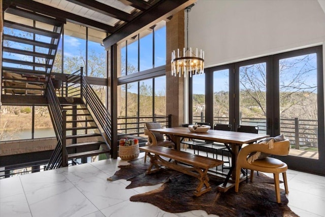1905 Big Horn Dr, Austin, TX 78734 - sunroom / solarium with plenty of natural light and a chandelier