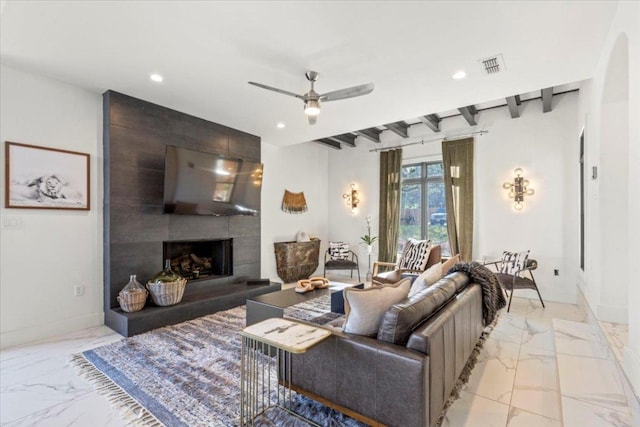 1905 Big Horn Dr, Austin, TX 78734 - living area with light marble finish floors, recessed lighting, ceiling fan, baseboards, and a large fireplace