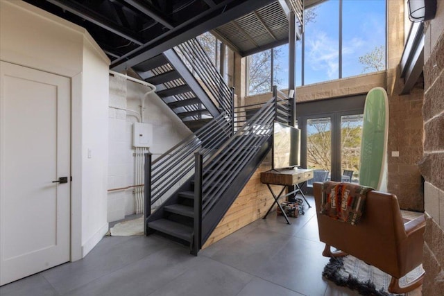 1905 Big Horn Dr, Austin, TX 78734 - stairway featuring healthy amount of natural light and a towering ceiling