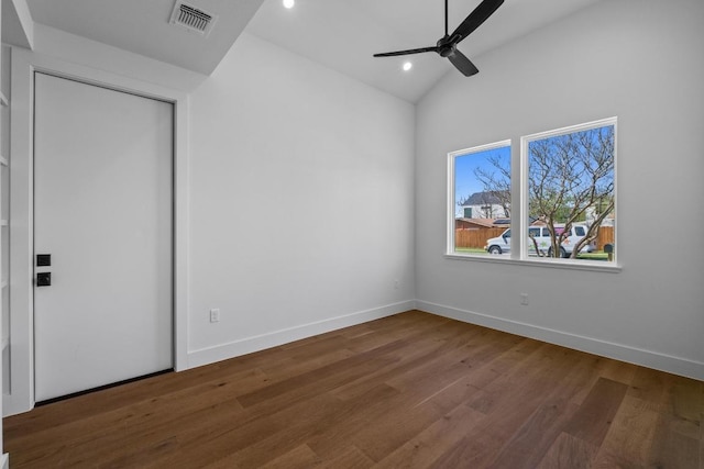 4525 S 3rd St, Austin, TX 78745 - unfurnished bedroom featuring lofted ceiling, wood finished floors, recessed lighting, and ceiling fan