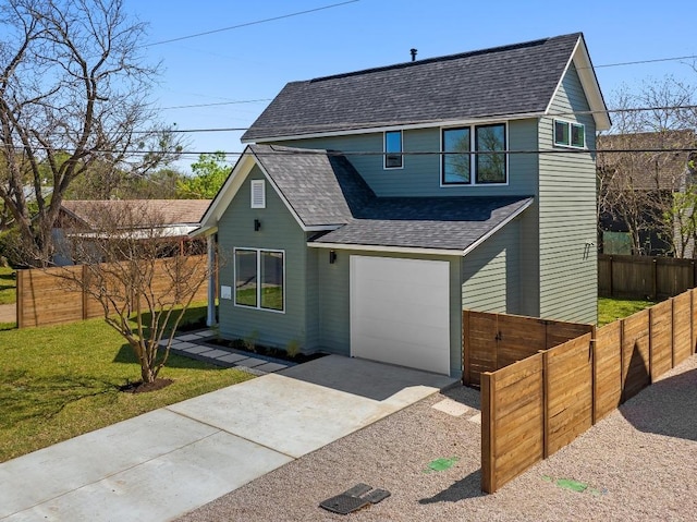 4525 S 3rd St, Austin, TX 78745 - view of front facade with roof with shingles, driveway, and a garage