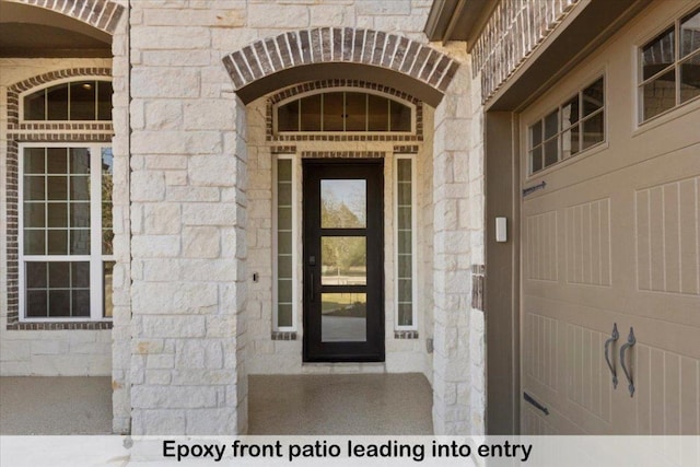 145 Gaston Dr, Bastrop, TX 78602 - doorway to property with stone siding